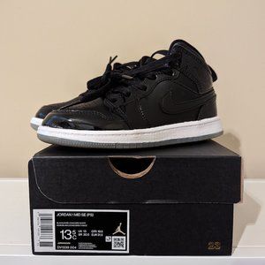 Kids black + patent leather Jordans, size 13.5C